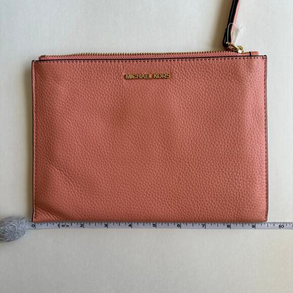 Michael Kors Handbags - NWOT MICHAEL KORS Light Pink Leather Wristlet Clutch